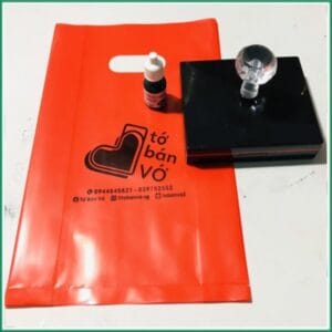 Con dấu in logo lên bao bì